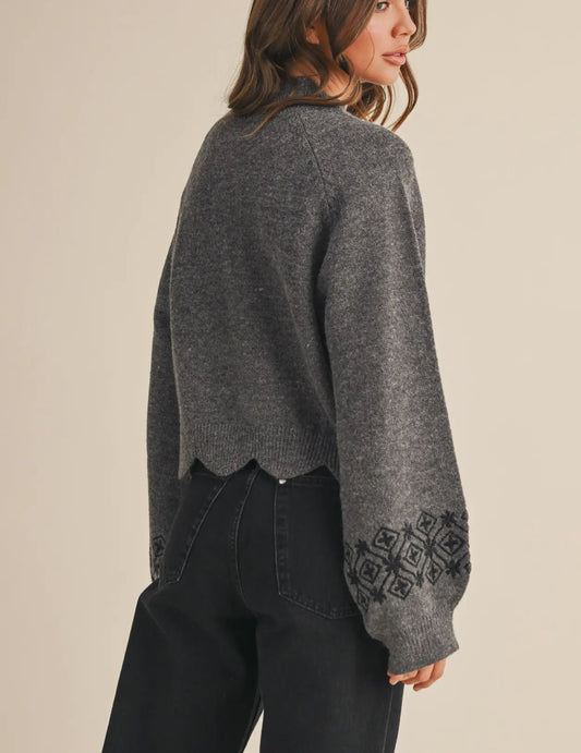 Scalloped hem sweater