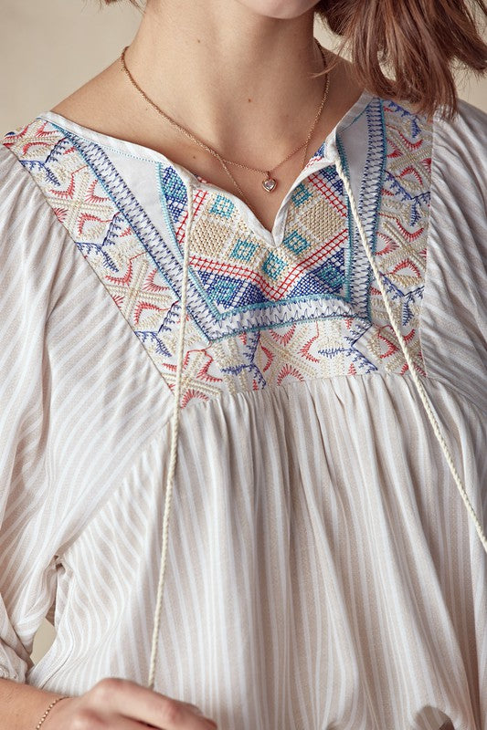 Embroidered Patch Trim Top With A Tassle